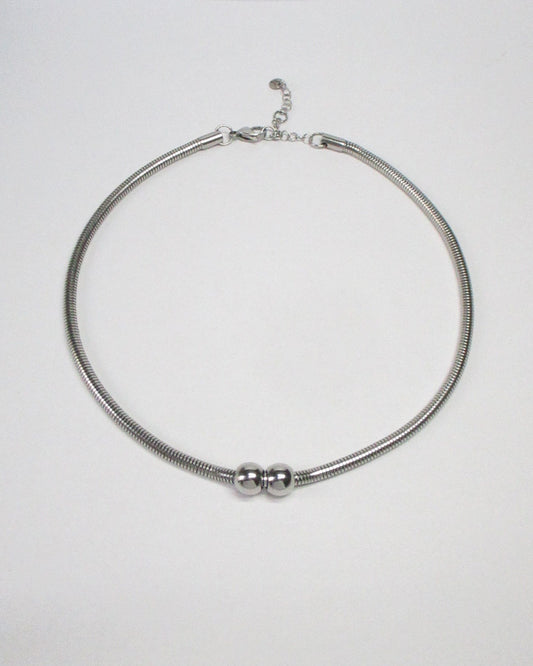 Gemini boulles steel necklace still portrait