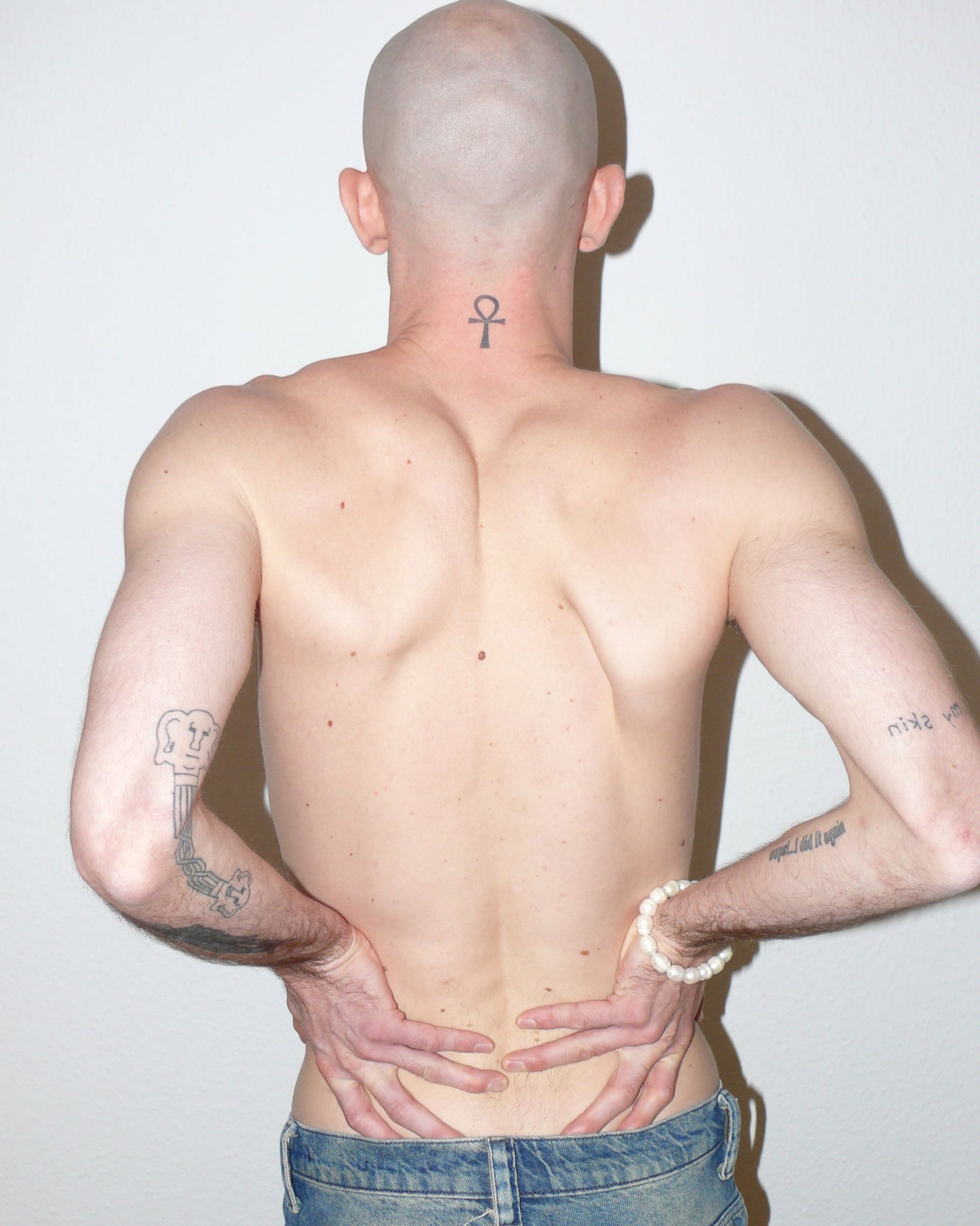 Gemstone freshwater pearls bracelet with piercing closure portrait on model back