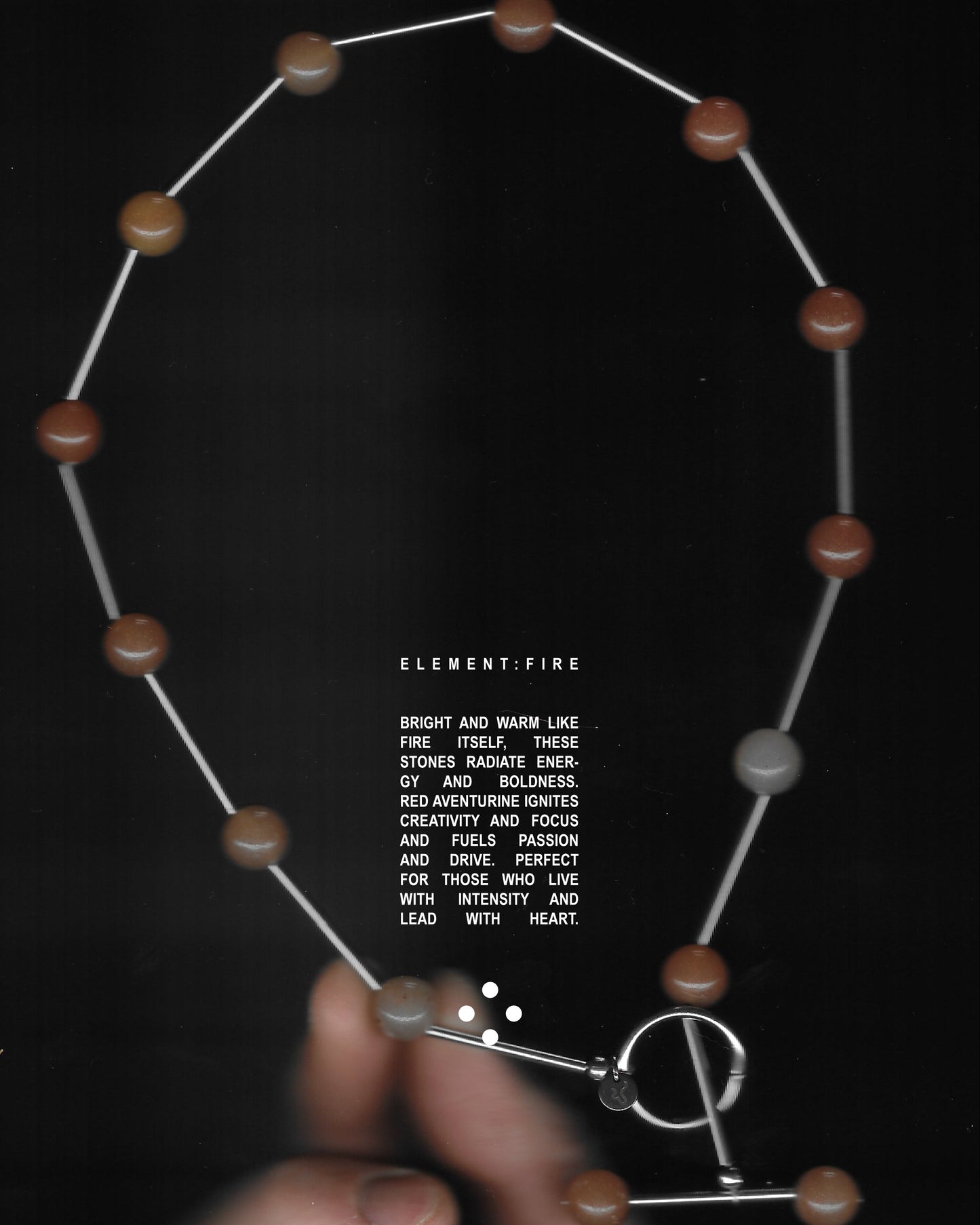 Red beaded necklace representing fire signs scan portrait