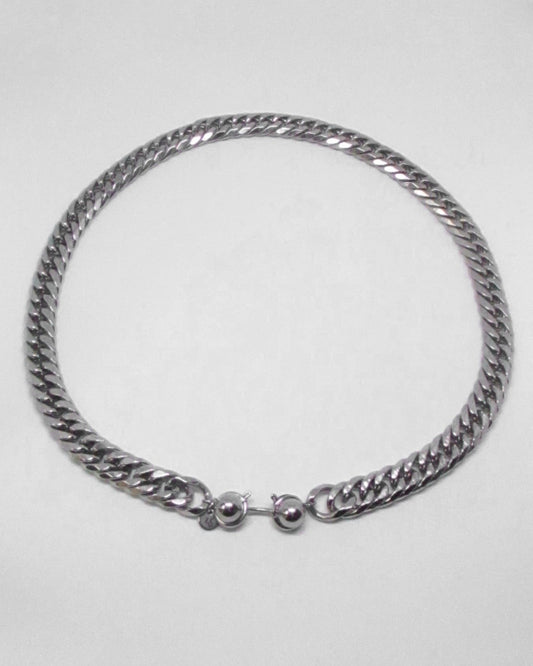 Silver chain necklace on a white background