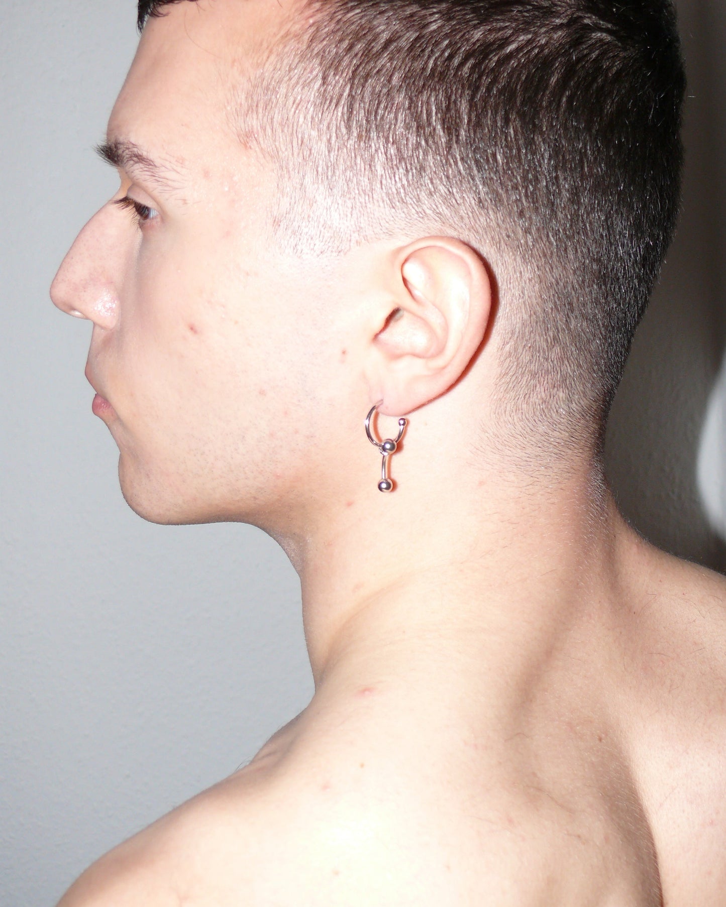 core single piercing open hoop worn