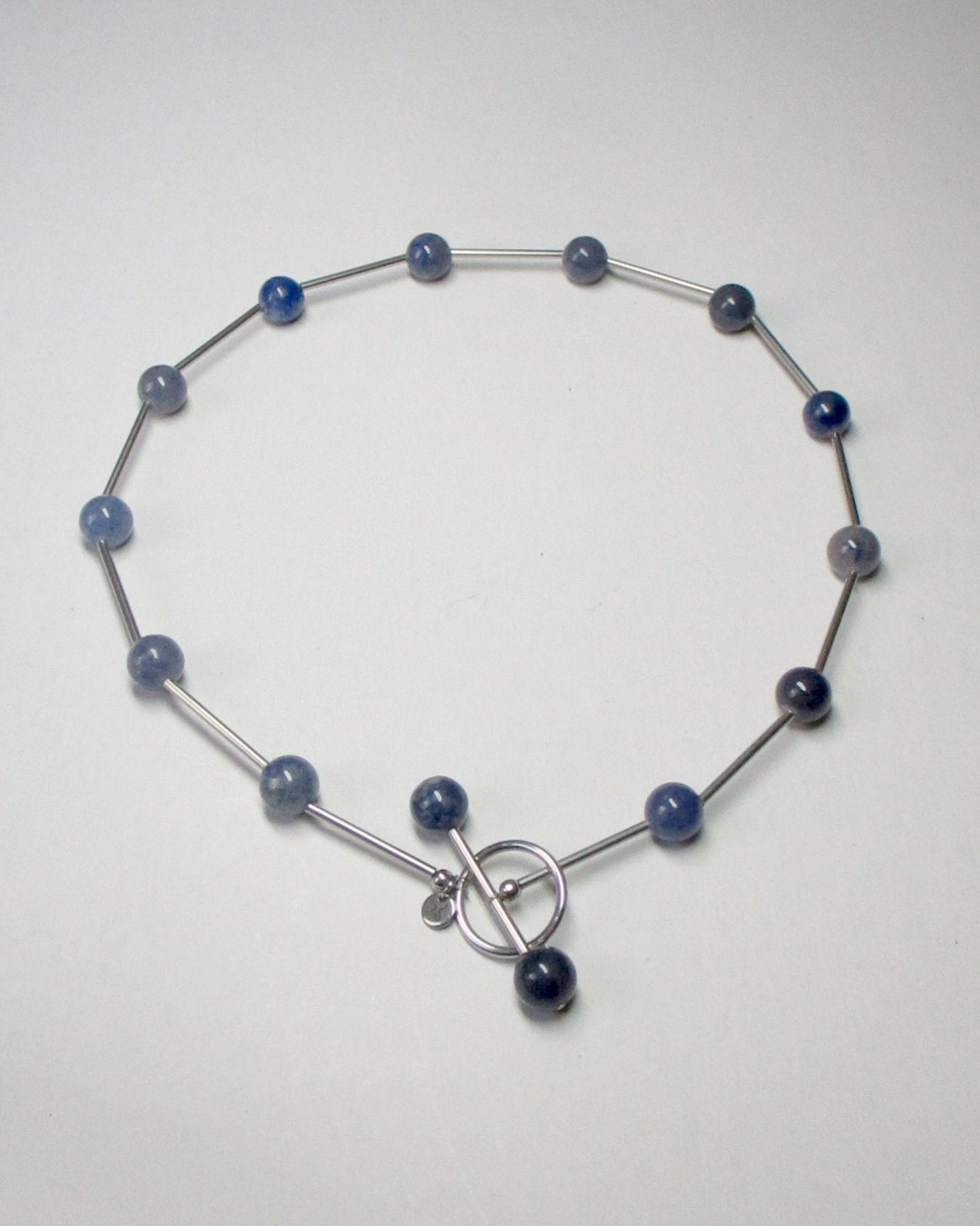 Blue beaded necklace representing water signs