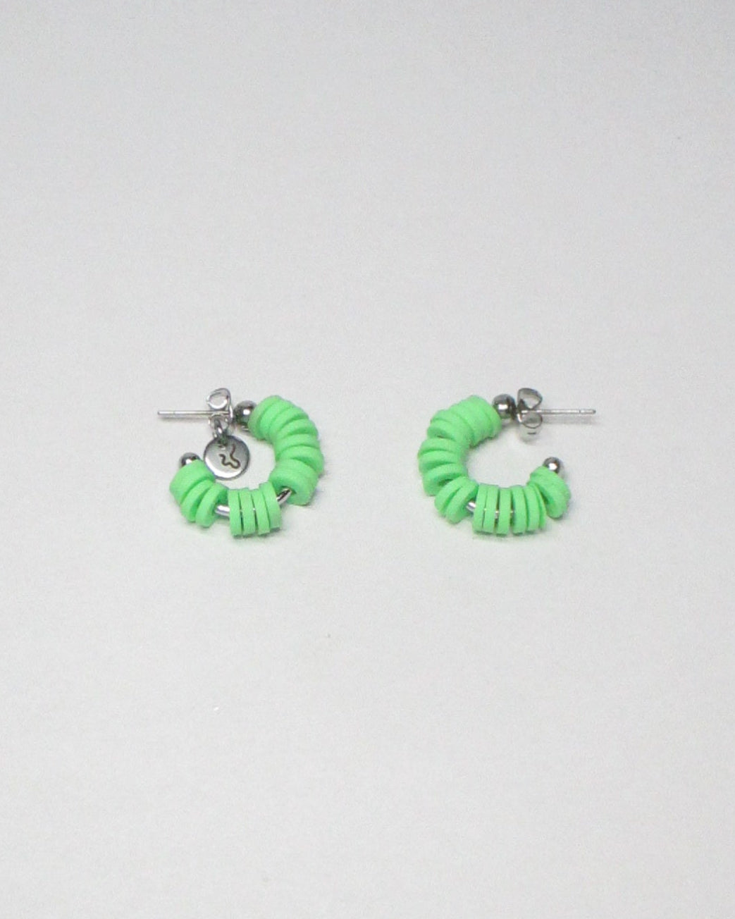 Brat green resin chips open hoops earrings still portrait