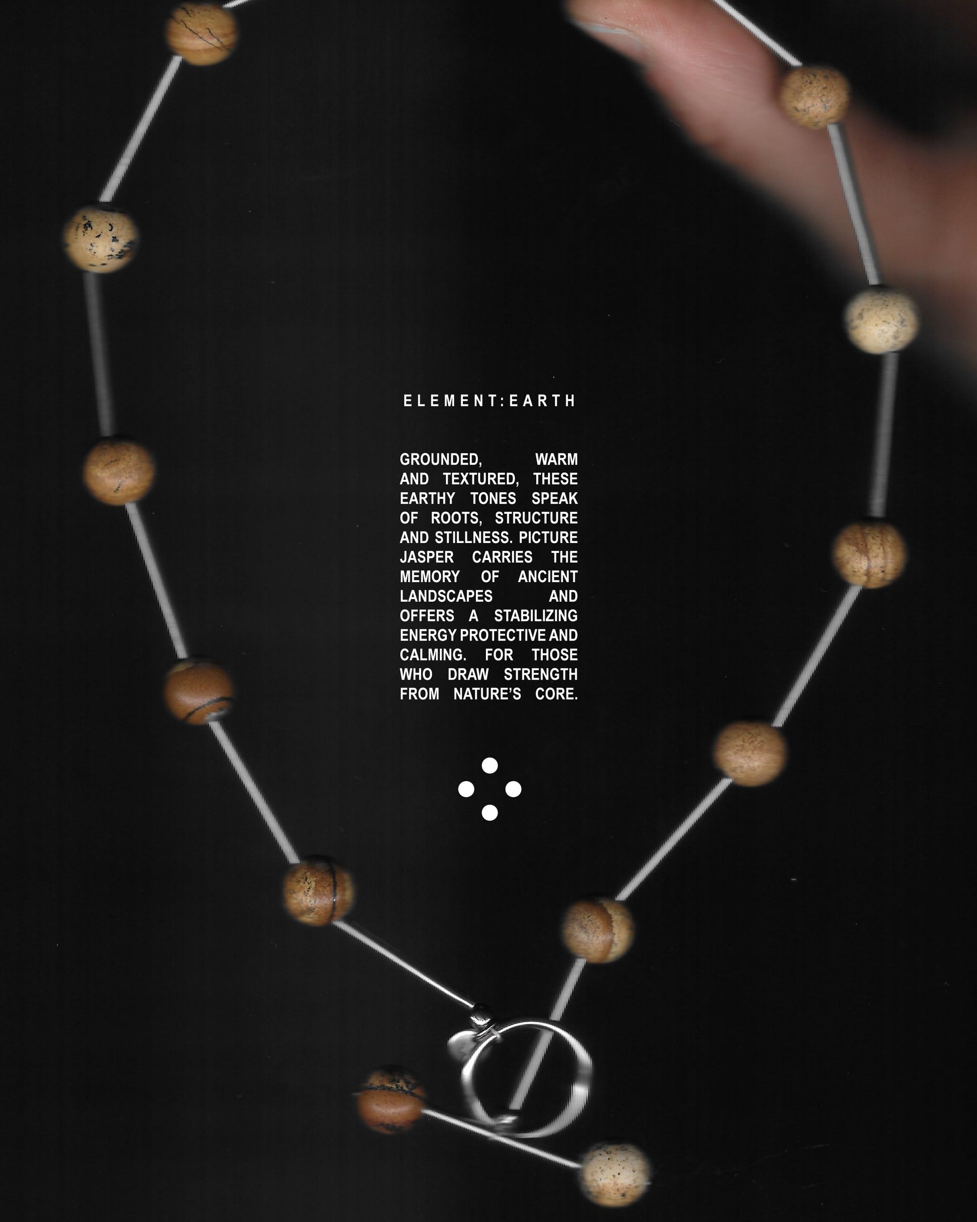 Brown beaded necklace representing earth signs scan