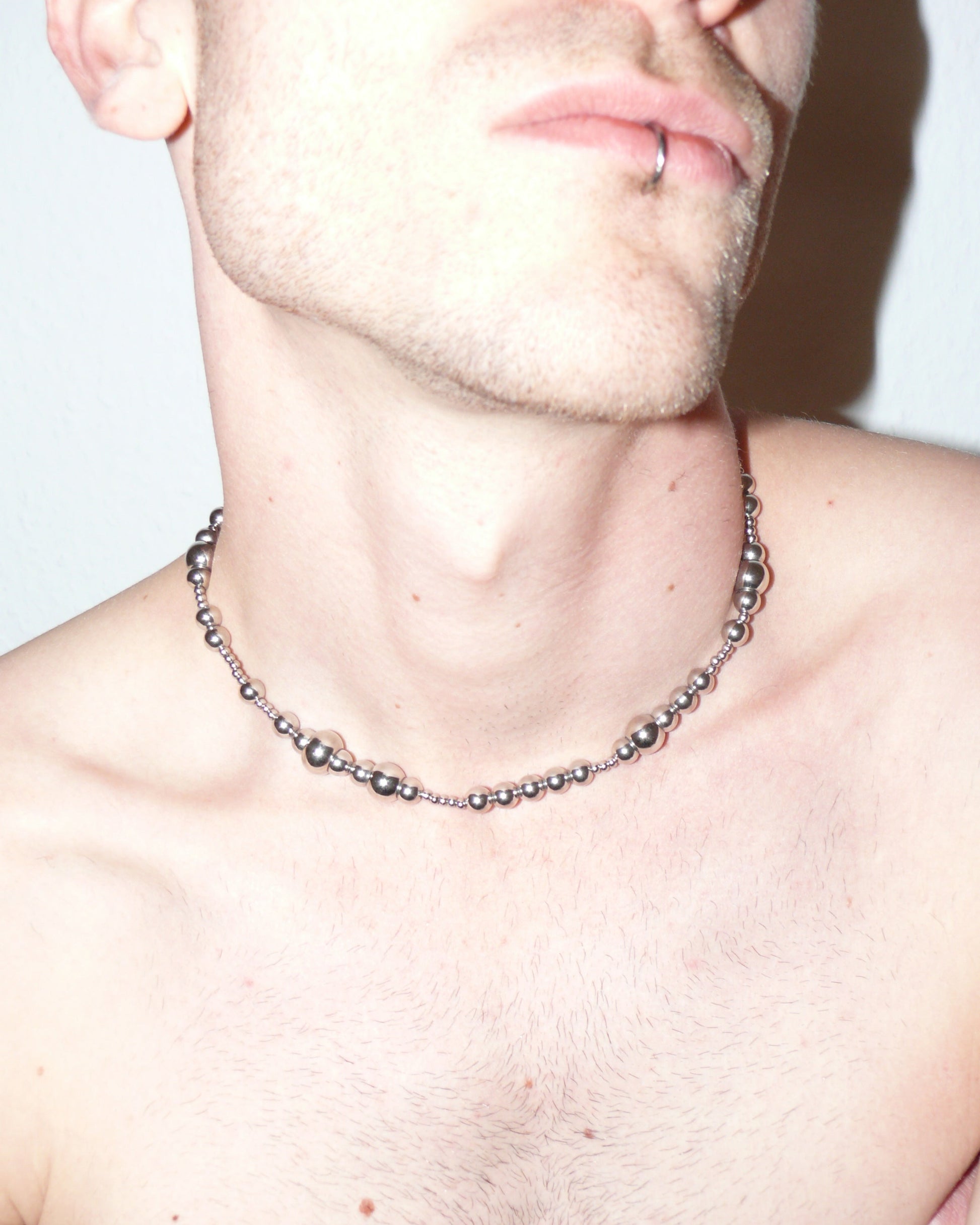 Bubbles steel necklace close-up on model neck