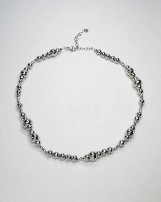 Bubbles steel necklace still portrait