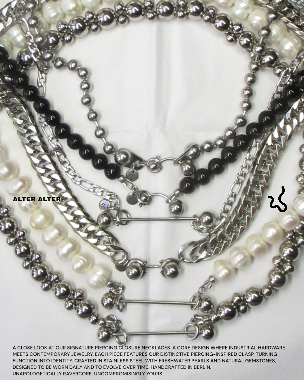 Collection of pearl and chain necklaces on a white background