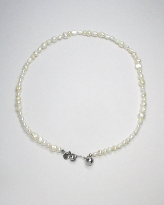 Freshwater pearls necklace with piercing closure still portrait