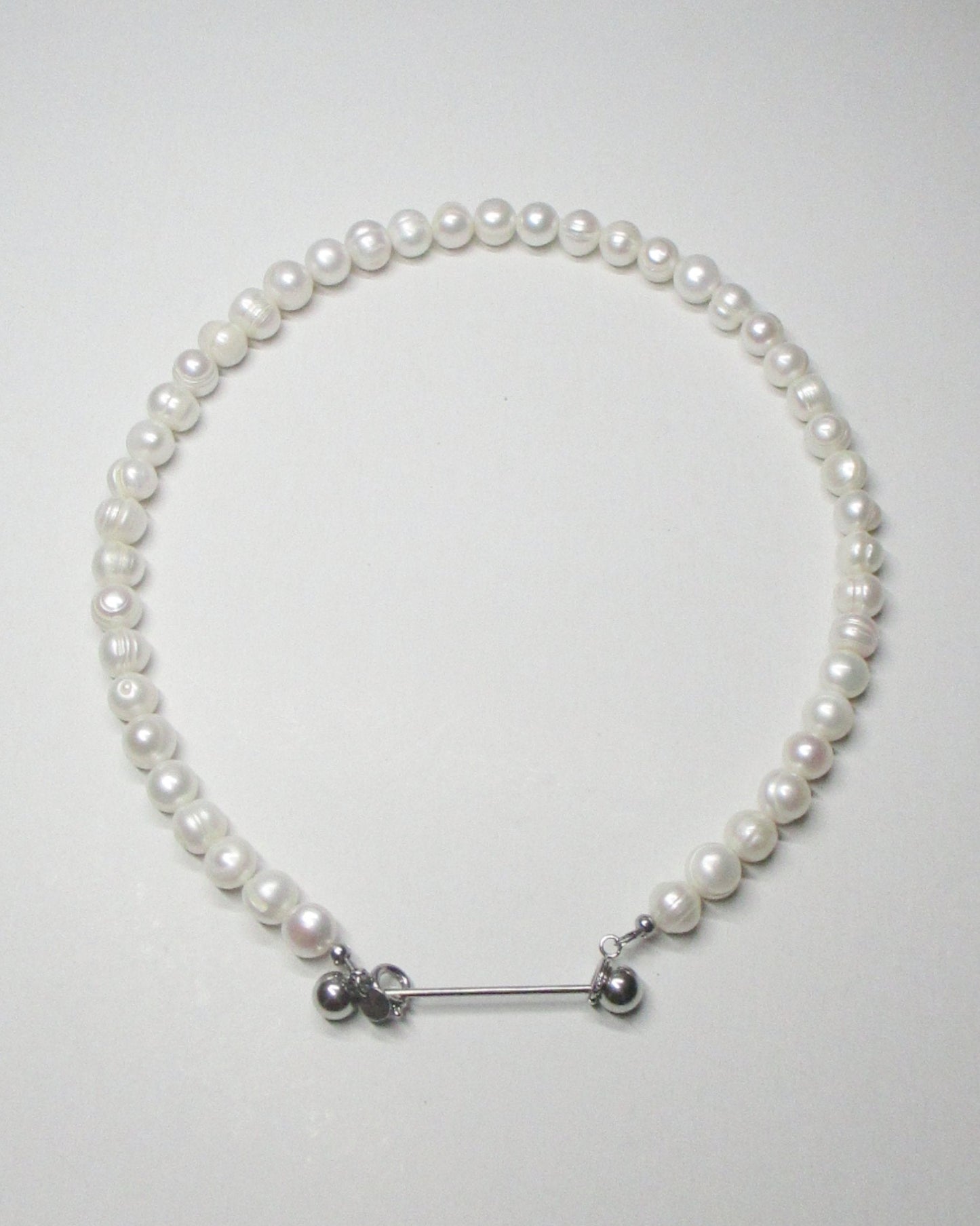 Gemstone freshwater pearls necklace with piercing closure still portrait