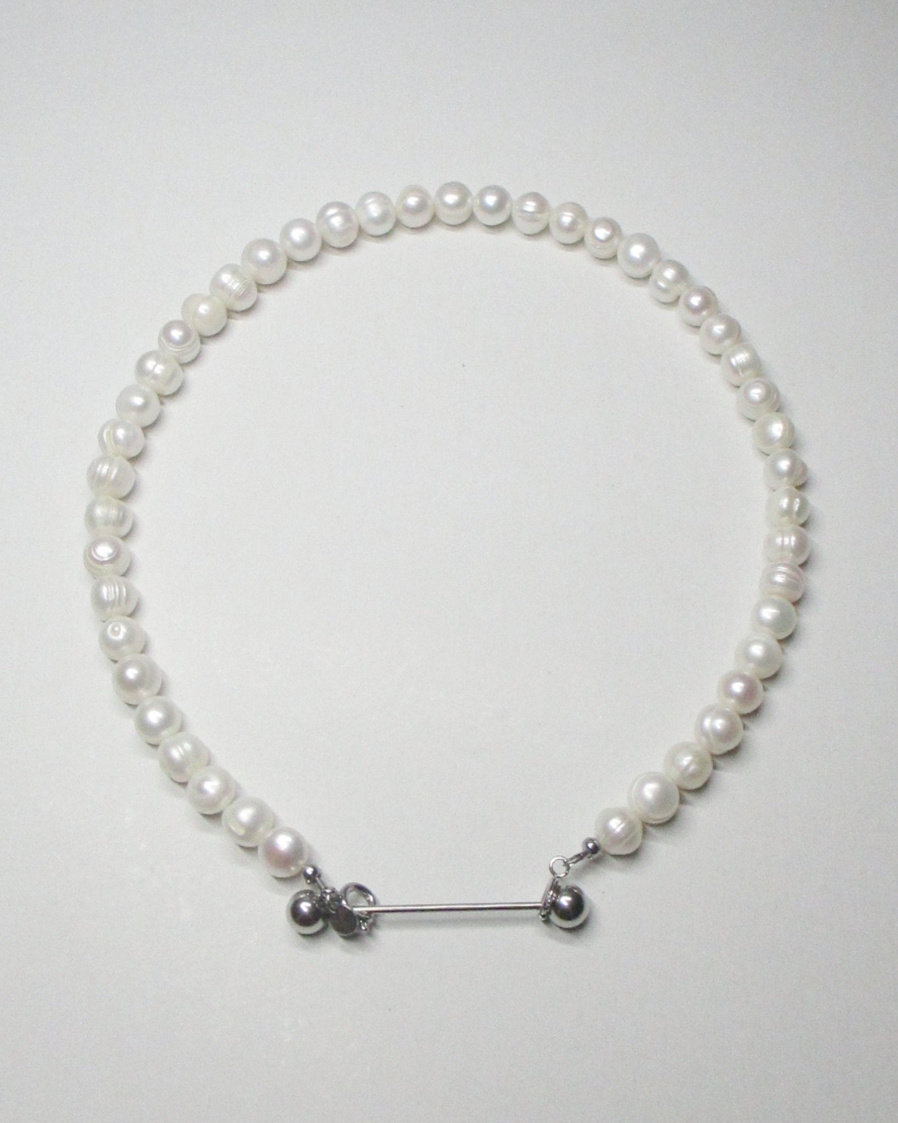 Gemstone freshwater pearls necklace with piercing closure still portrait
