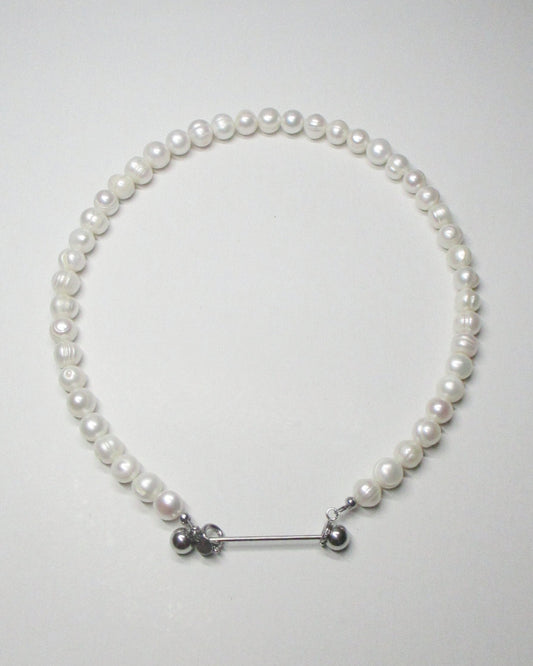 Gemstone freshwater pearls necklace with piercing closure still portrait