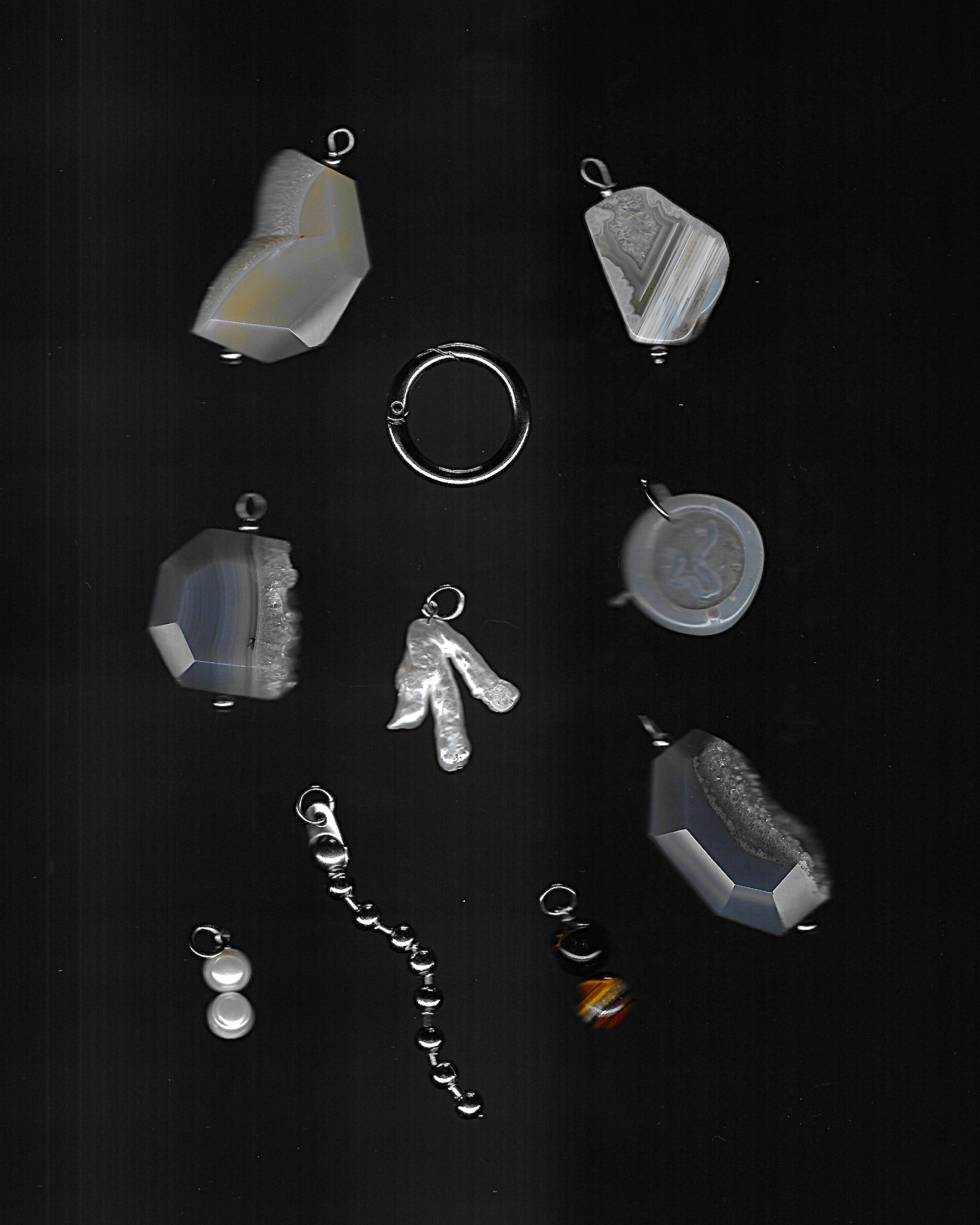 Gemstones and steel charm components scan