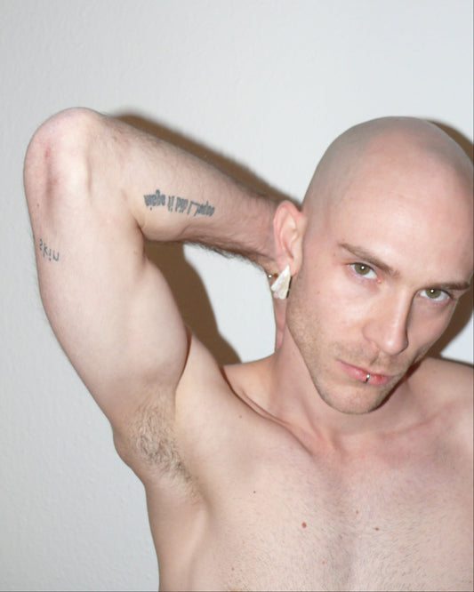 Ghost shaped freshwater pearl earrings with piercing decoration portrait on model