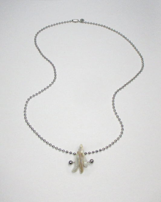 Ghost shaped freshwater pearl pendant necklace still portrait