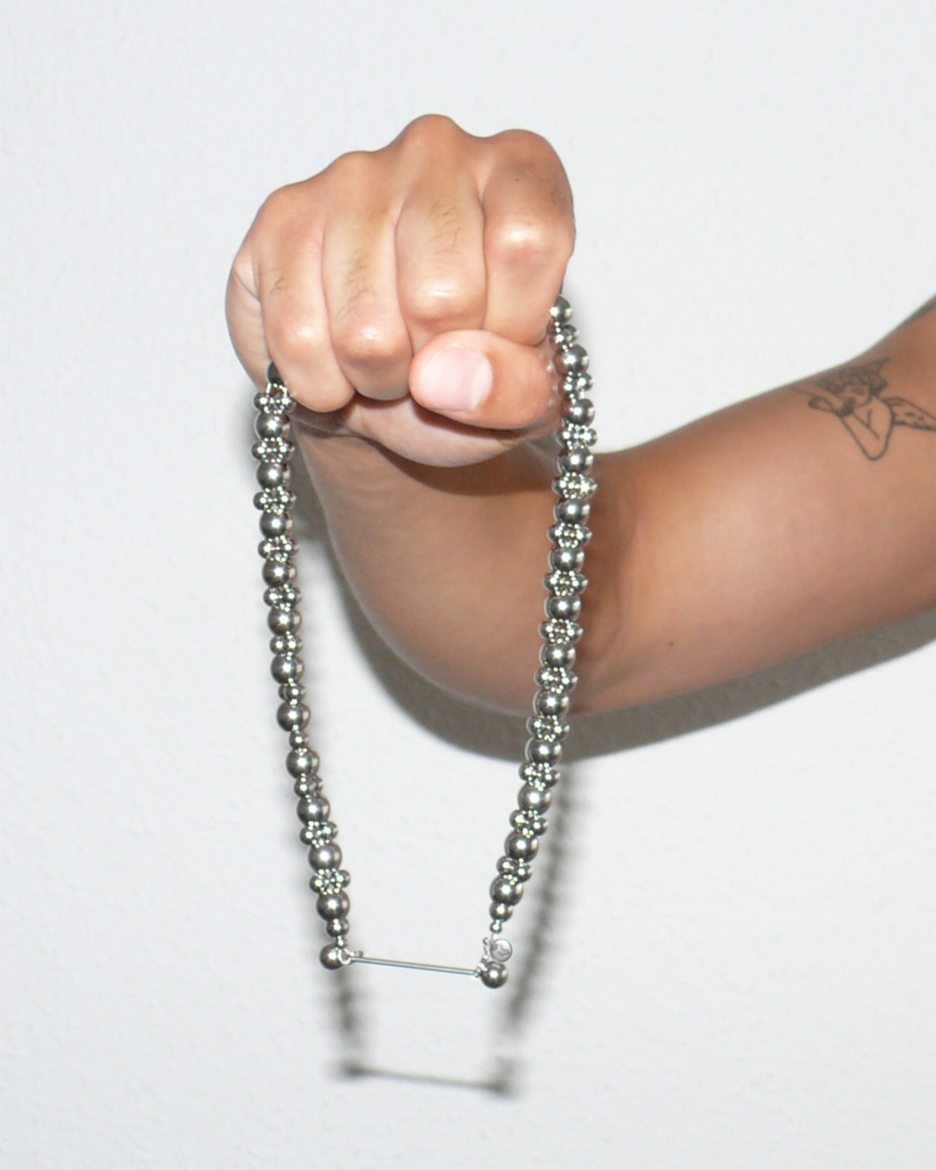 Hold steel beaded necklace piercing closure