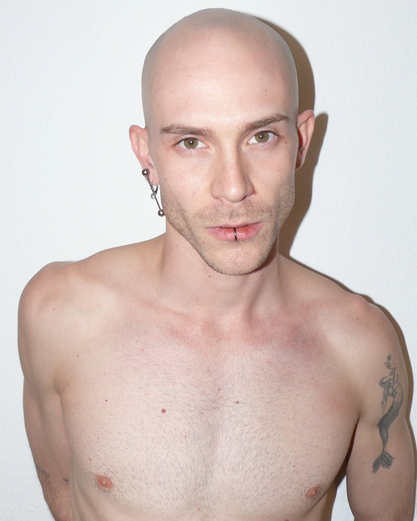 Maxi barbell piercing single earring frontal portrait on white model