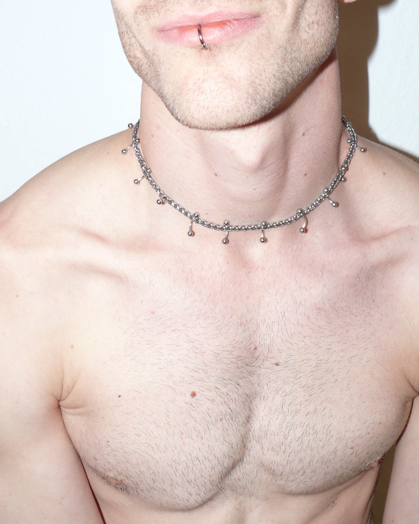 Mille barbells piercing necklace top close-up on model