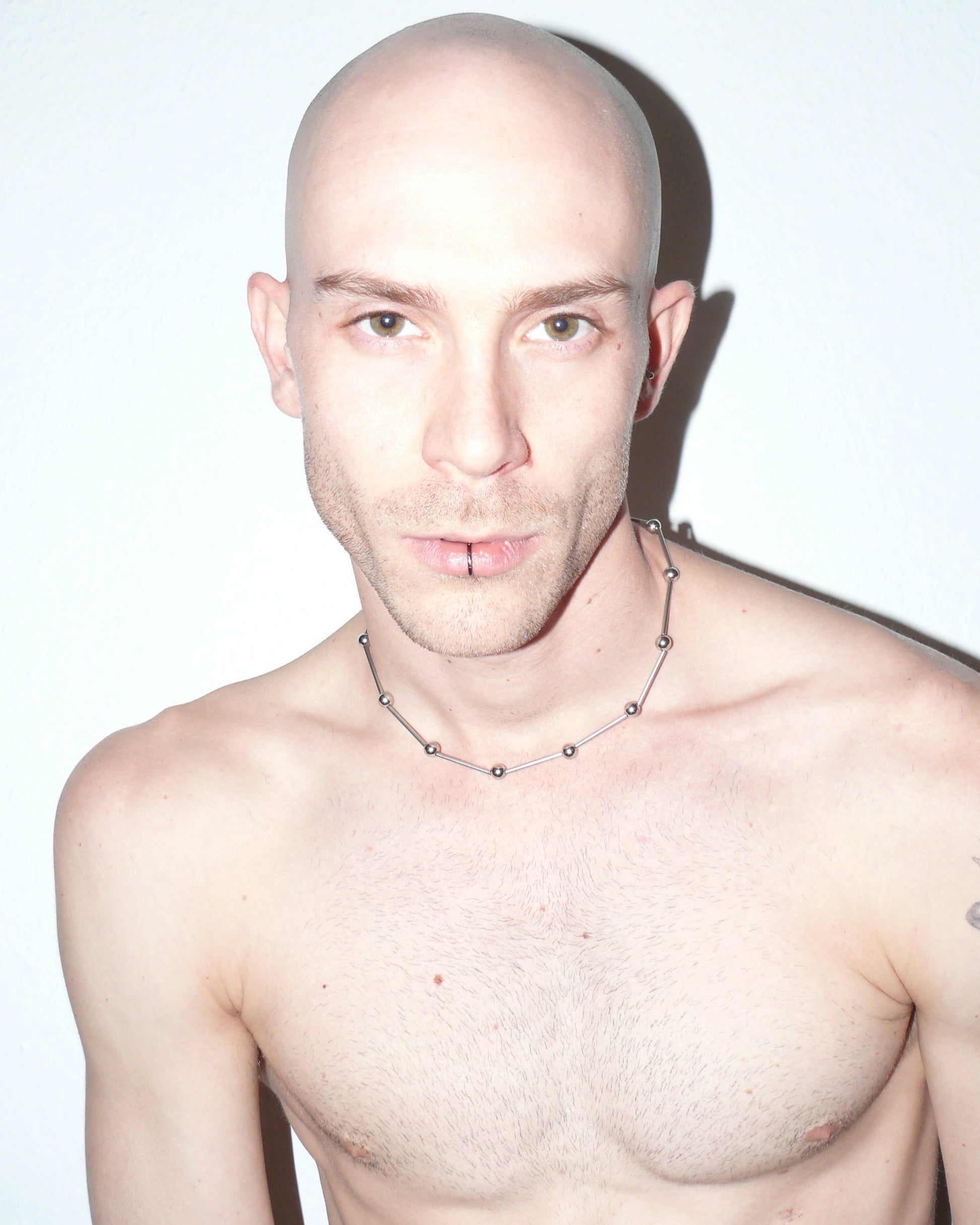 Mille barbells steel necklace close-up on model