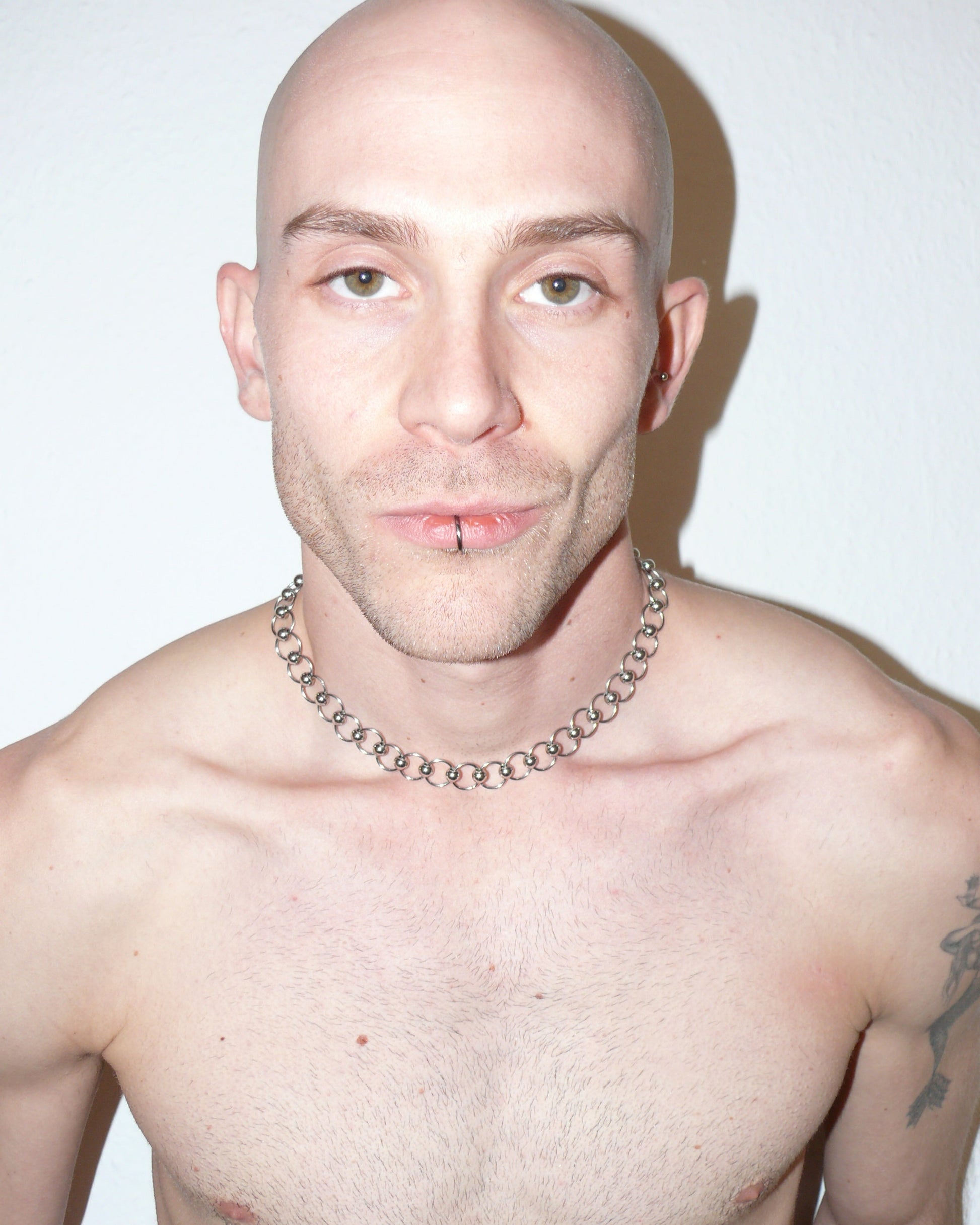 Mille captive style piercing steel necklace frontal close up on model