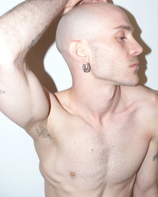 Mille steel rings hoops earrings side portrait model