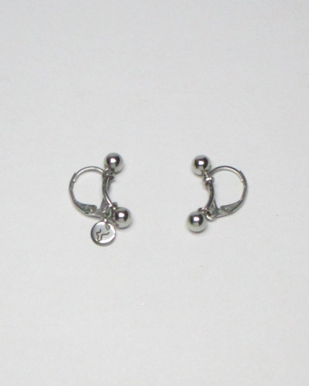 Mini banana piercing earrings still portrait