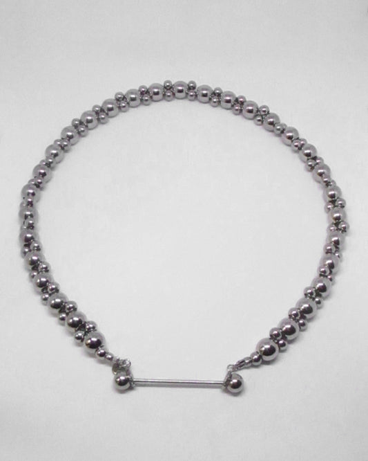 Silver double beaded necklace on a white background