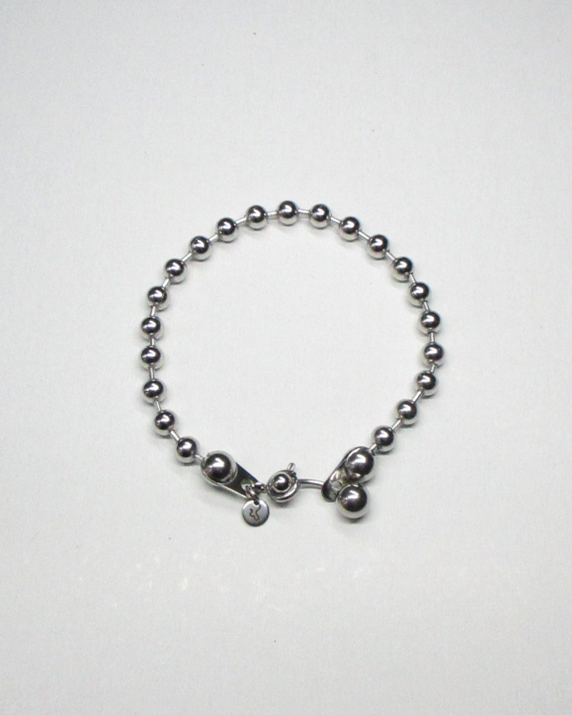 Steel ballchain bracelet with piercing closure still portrait