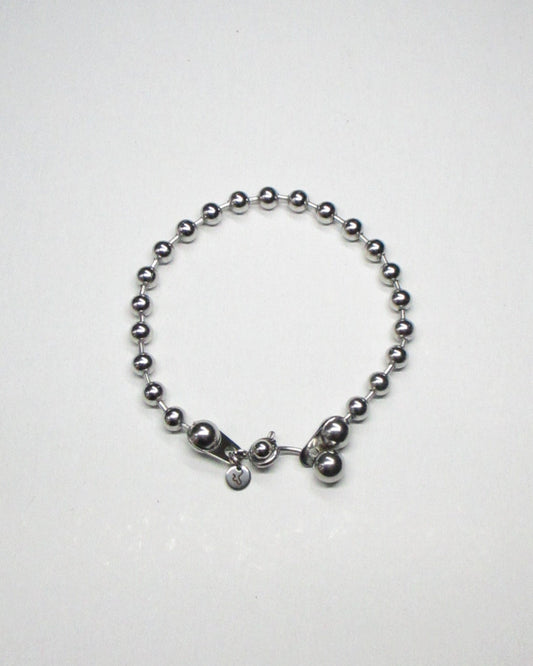 Steel ballchain bracelet with piercing closure still portrait