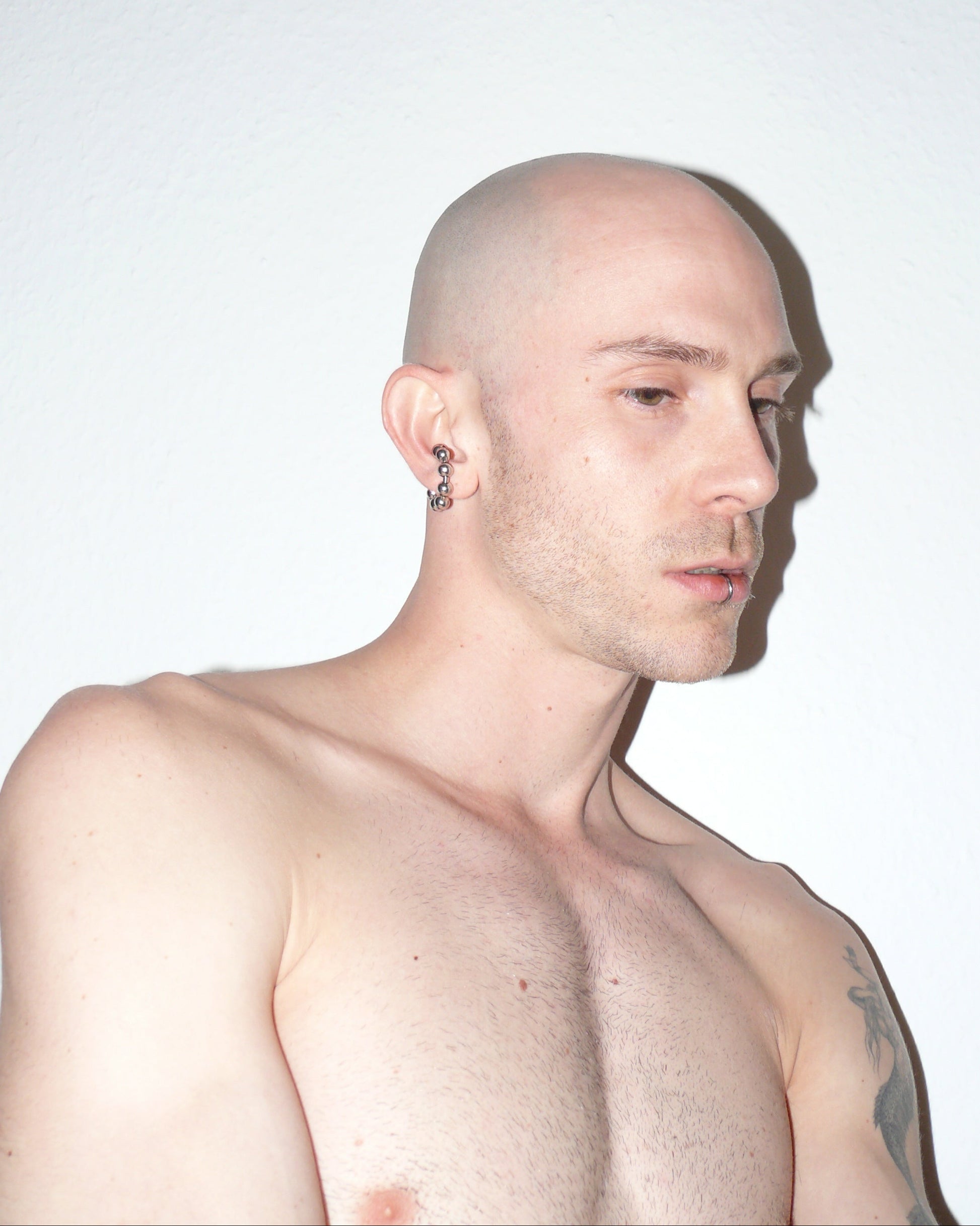 Steel ball chain cuff close up portrait on model