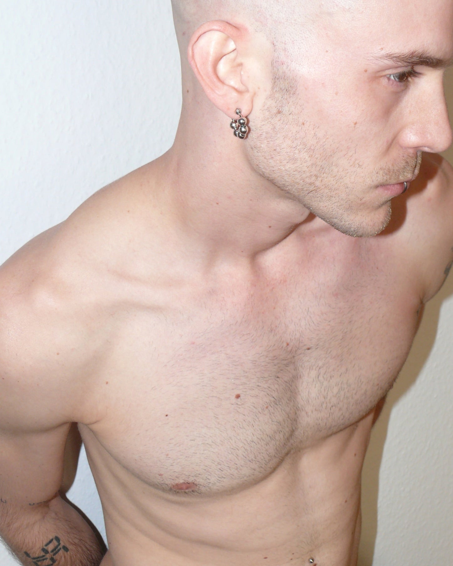 Steel ball chain mini open hoops earrings close up portrait on white model