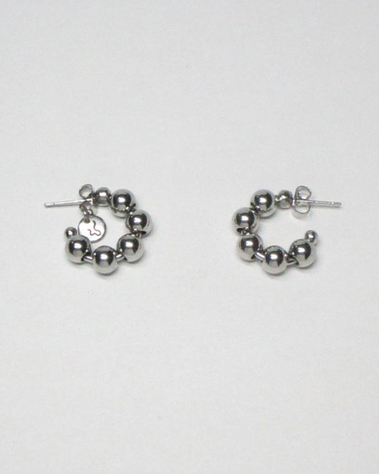 Steel ball chain mini open hoops earrings still portrait