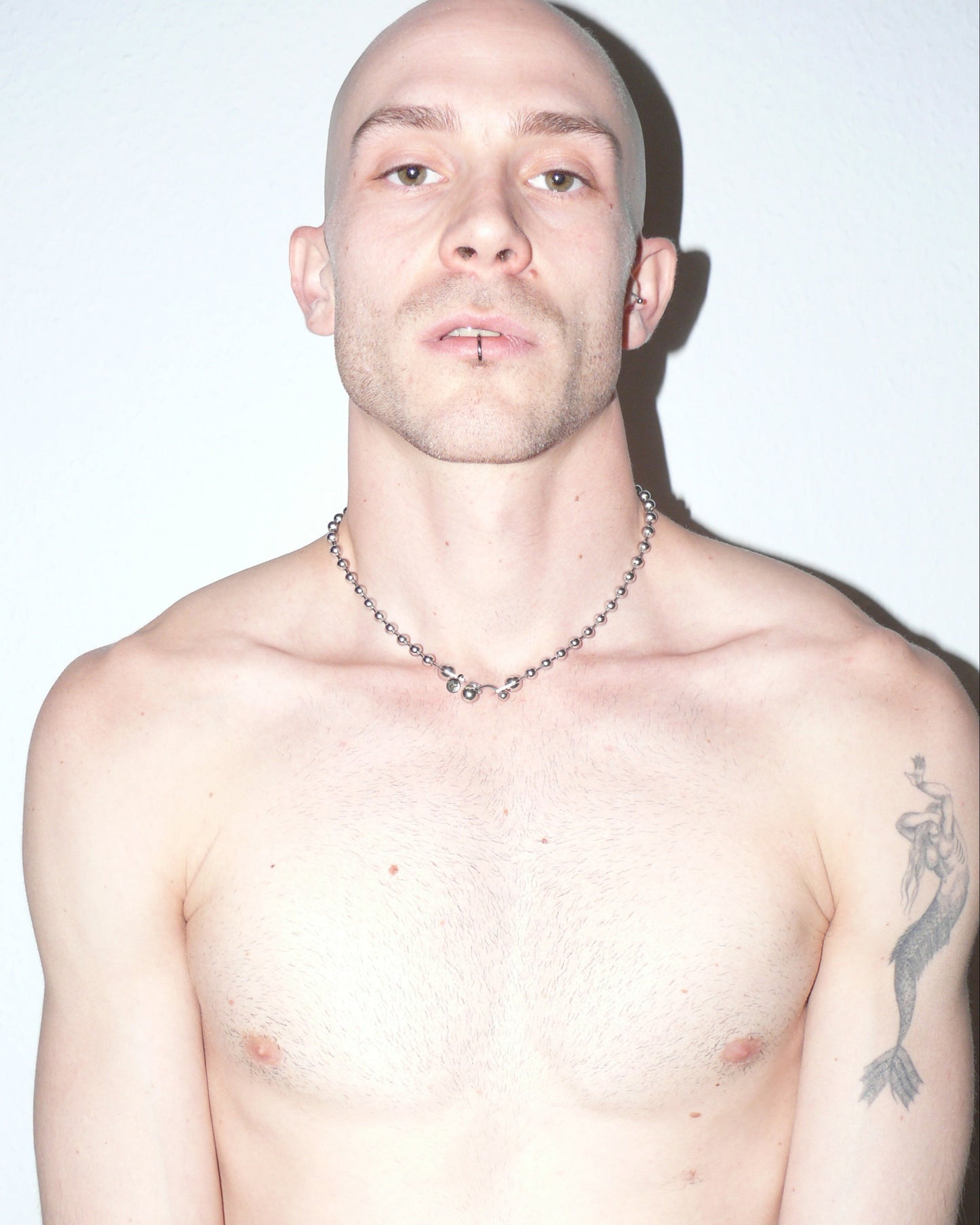 Steel ball chain necklace with piercing closure portrait on model