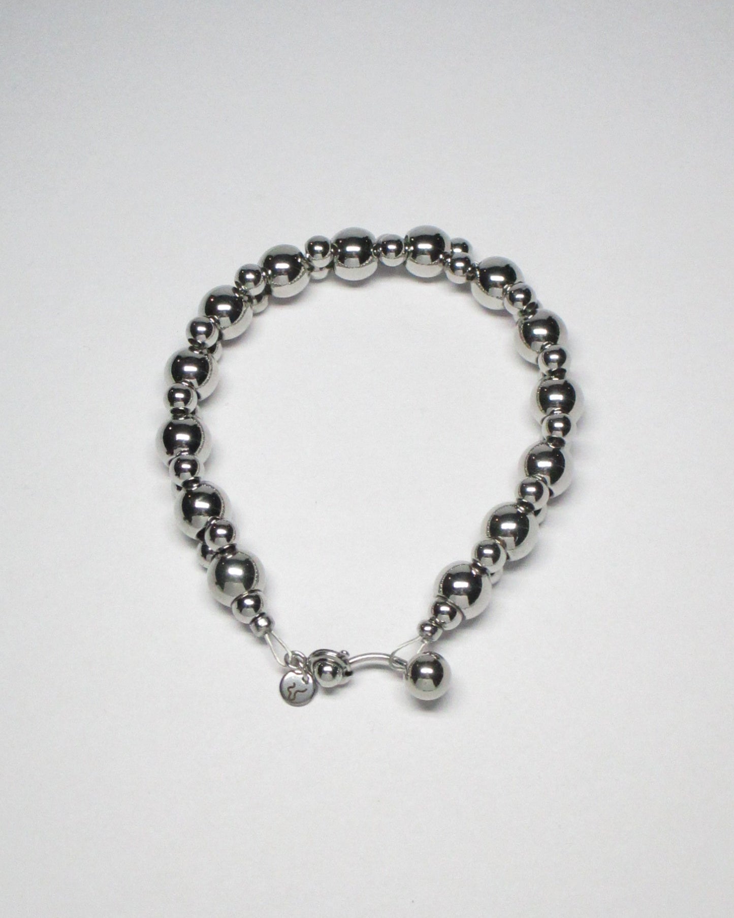 Steel beaded bracelet with piercing closure still portrait
