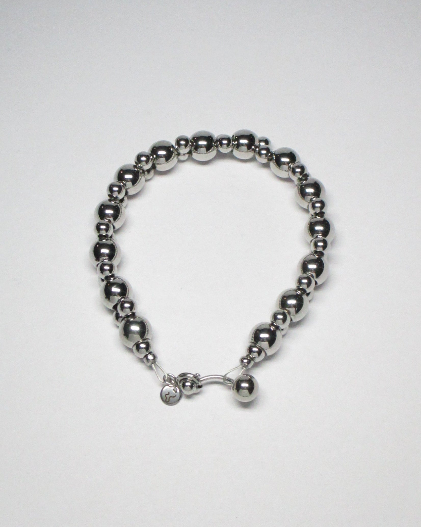 Steel beaded bracelet with piercing closure still portrait