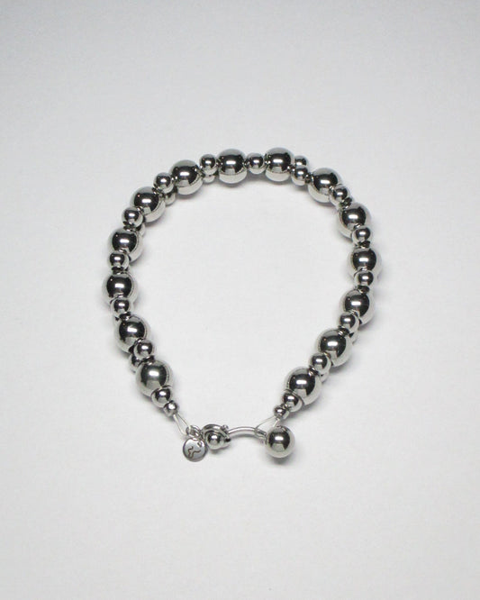 Steel beaded bracelet with piercing closure still portrait