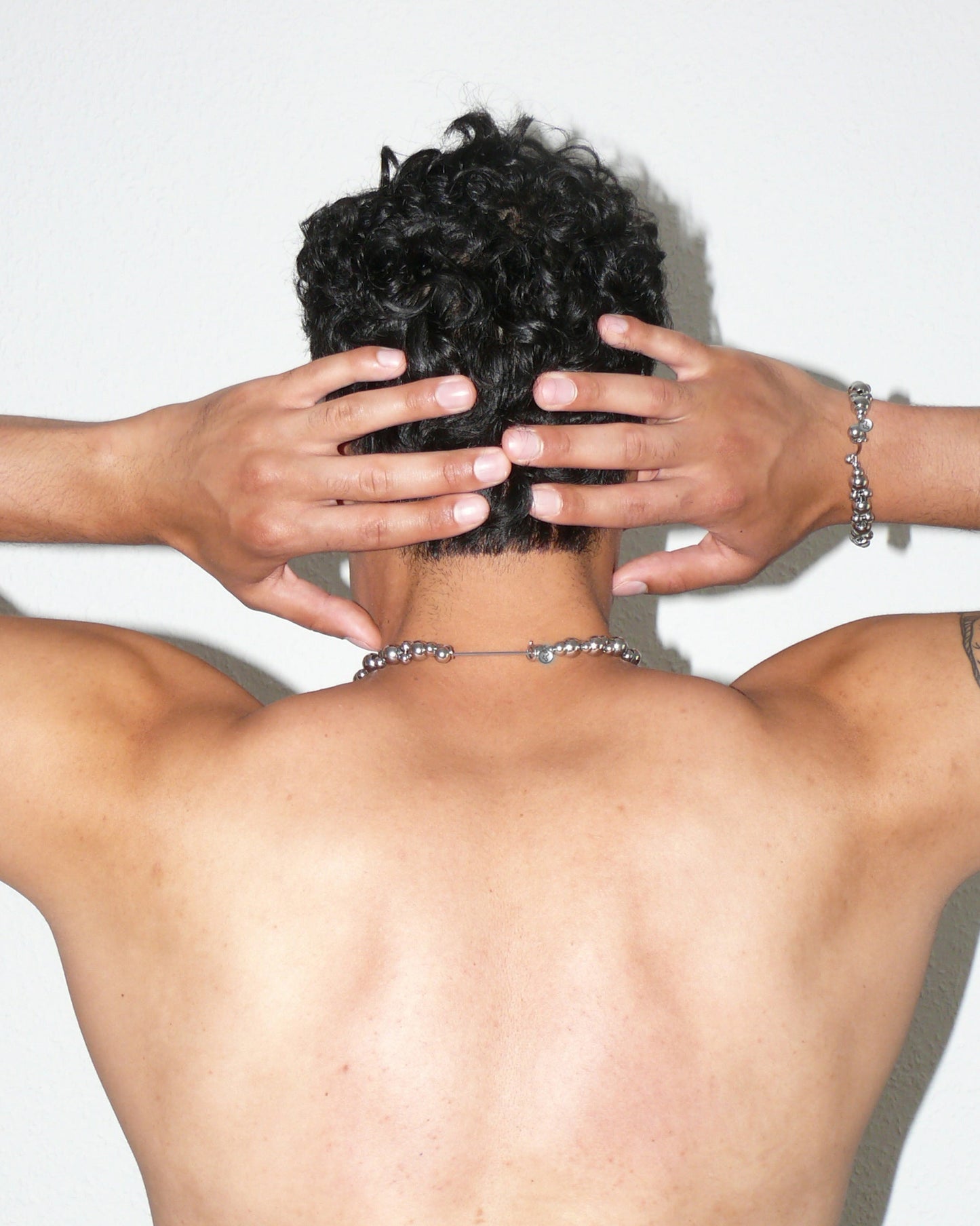 Steel beaded necklace and bracelet alteralter portrait on model back