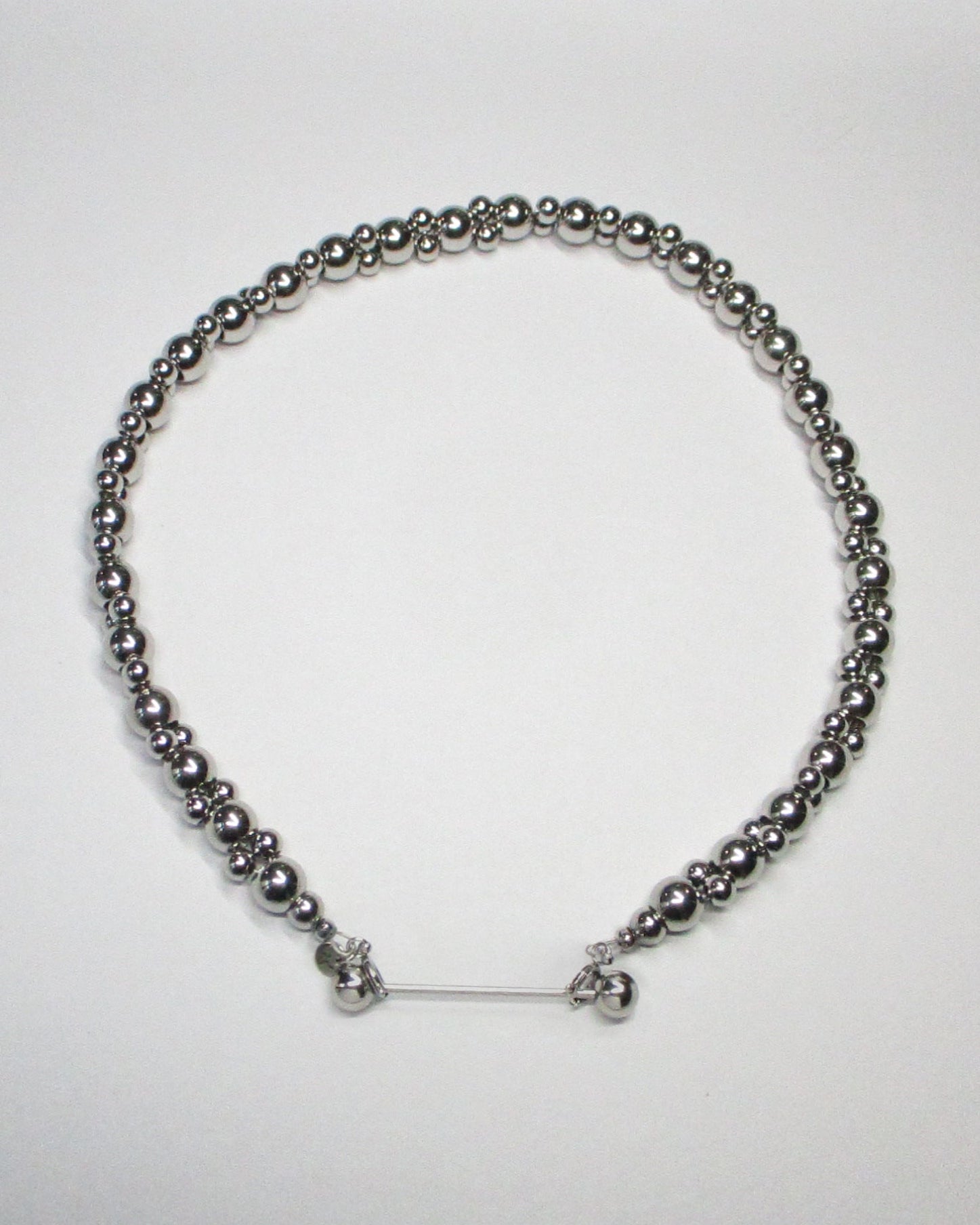 Steel beaded necklace with piercing closure still portrait