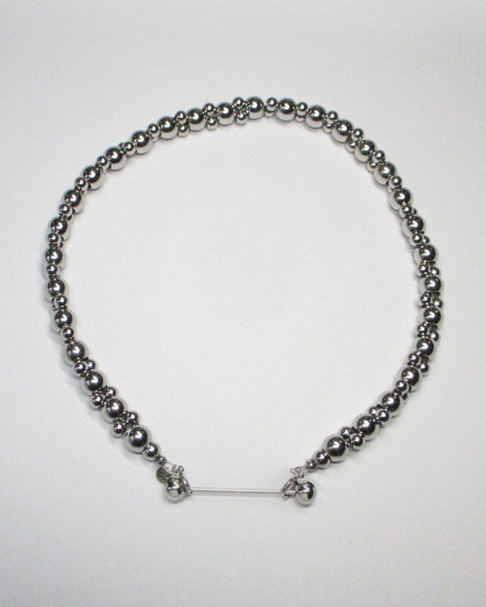 Steel beaded necklace with piercing closure still portrait