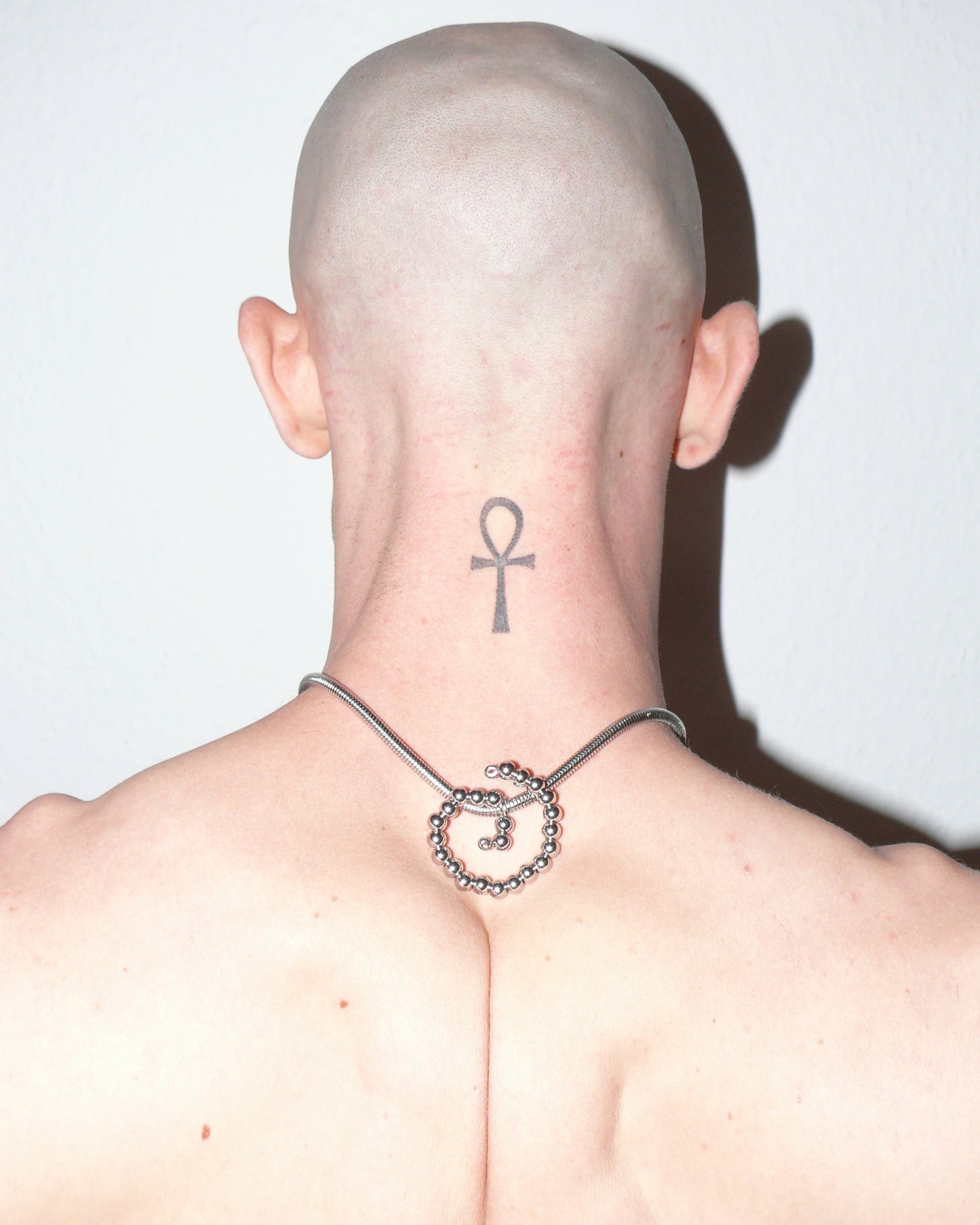 Steel beaded spiral snake chain necklace fluid portrait on model back