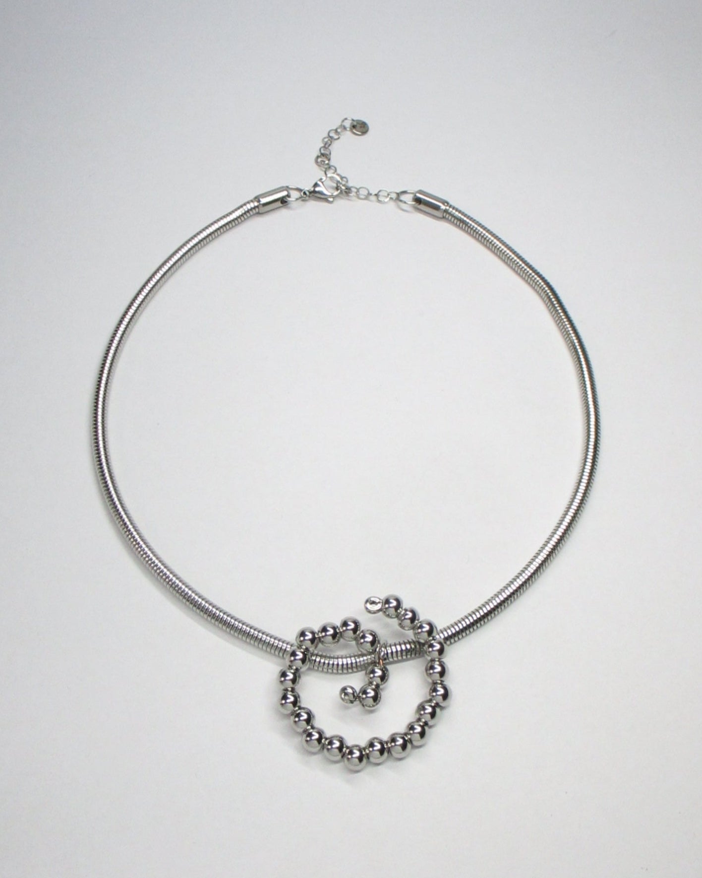 Steel beaded spiral snake chain necklace still portrait