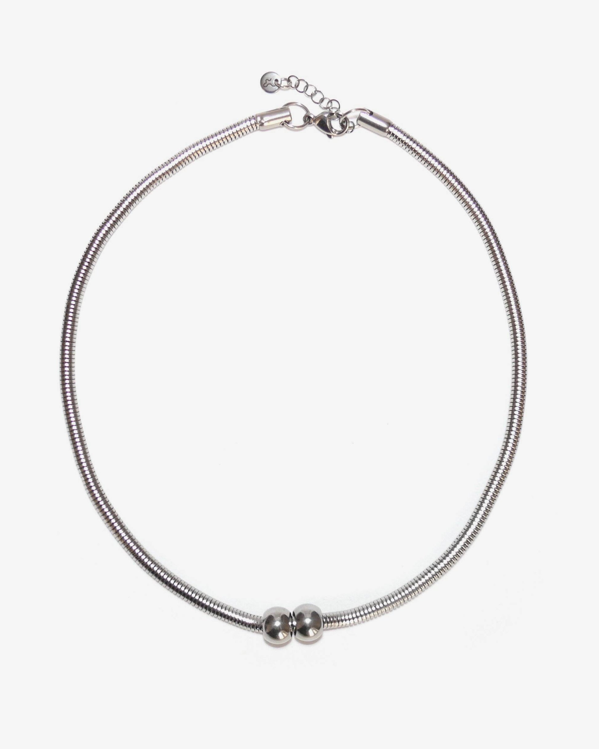 core necklace gemini piercing still