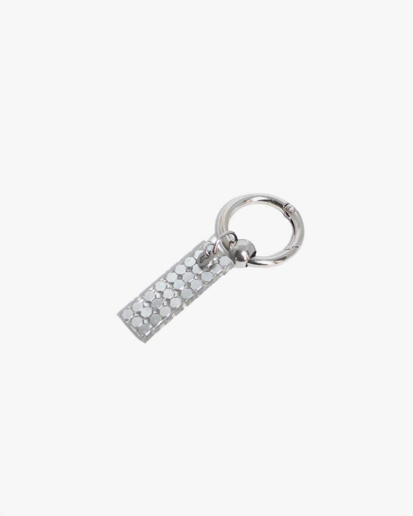 core objects clubby tag charm still