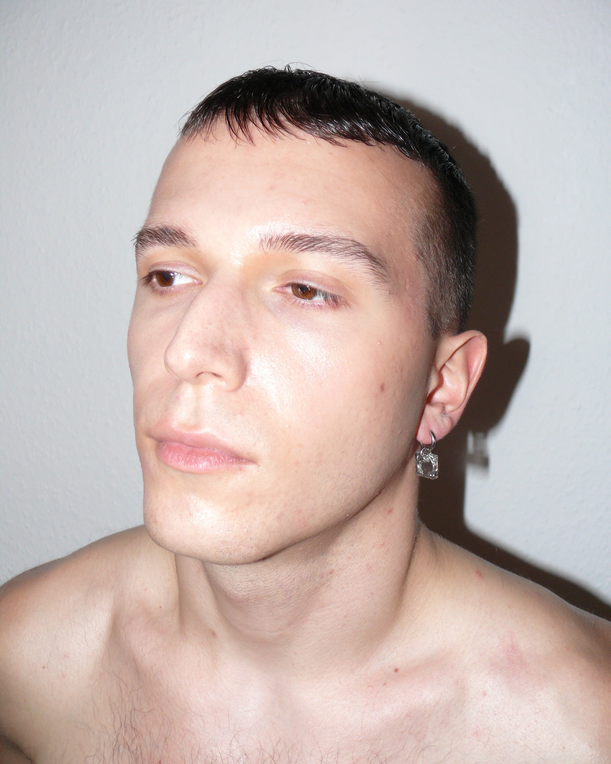 core single candy piercing earring worn